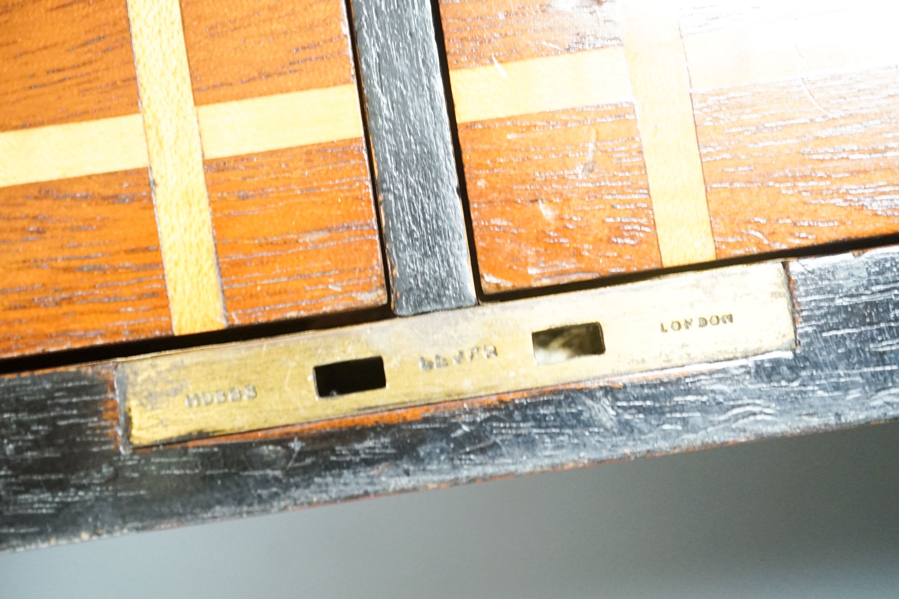 An aneroid barometer in circular polished oak surround and a banded and inlaid two section tea casket, 30.5 x 16.5cm